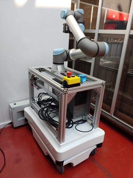 The AGV automatically gets the finished products from one machine and brings them to empty stations, which is a good example for M2M.